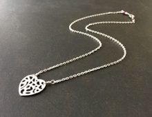 Sterling Silver with Romantic Red Garnet Accents.